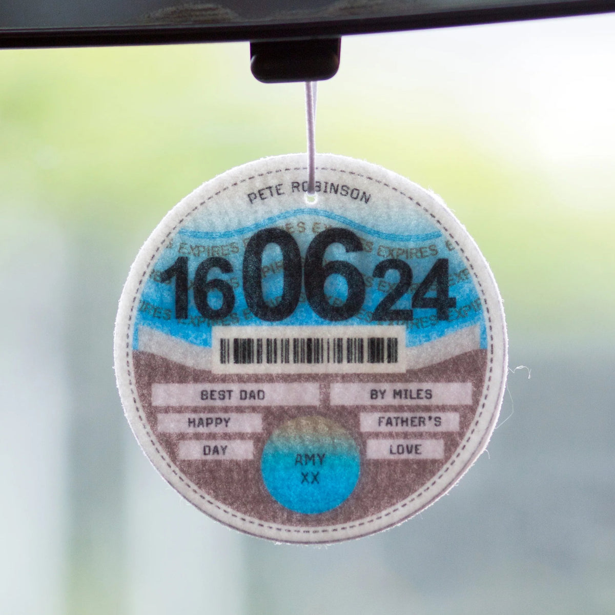 Hanging car accessory fragranced with eucalyptus and customised with a personal message