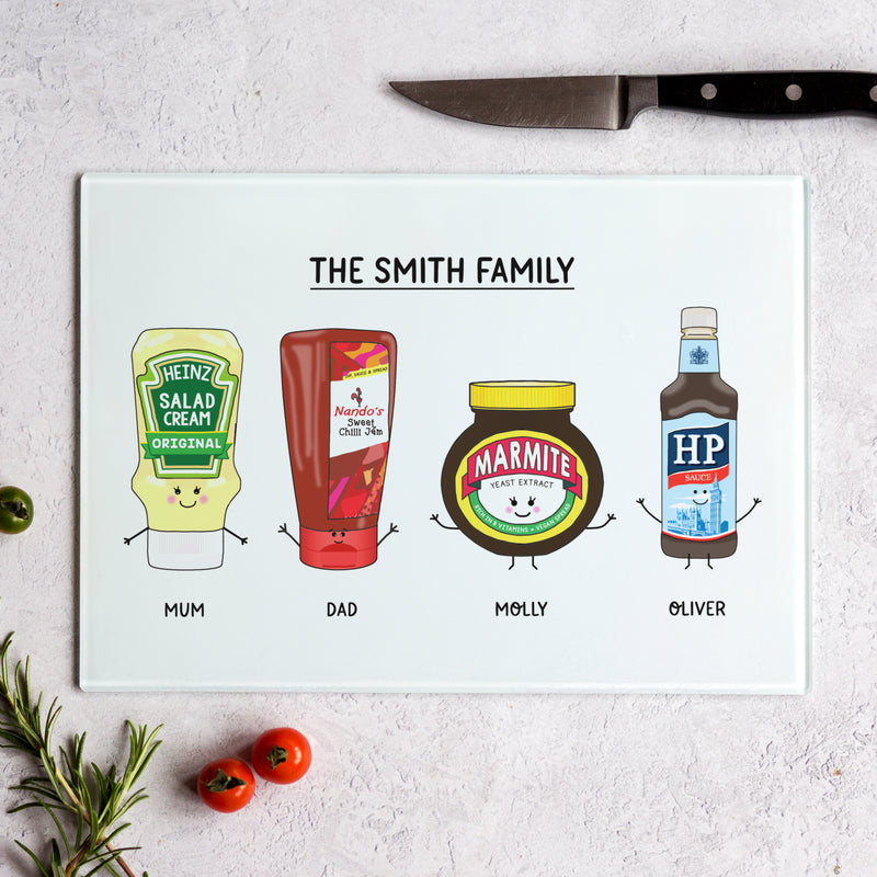 a glass chopping board customised with illustrations of your family as their favourite sauces